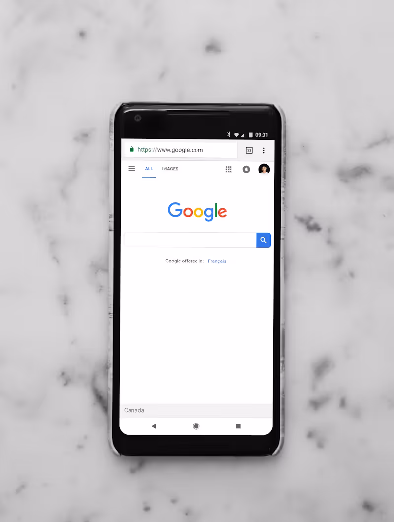 Smartphone showing Google search homepage, AI search tools still draw answers from traditional SEO rankings